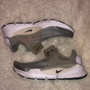 Gray sockdarts. Gently worn.